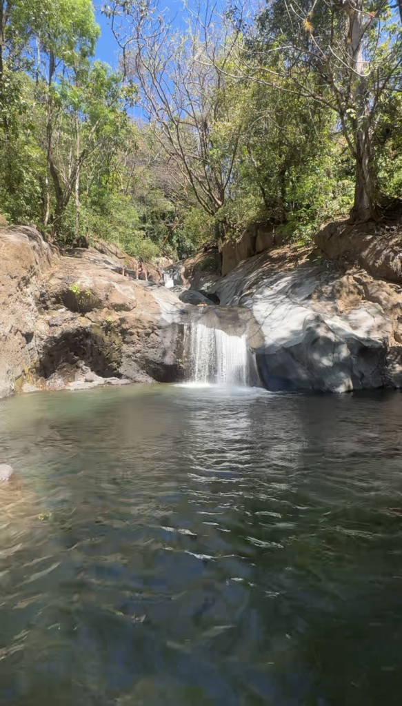 The crystal-clear natural pool beneath Las Minas Waterfall in Atenas, Costa Rica. Photo: Shawn Brooks Photography
