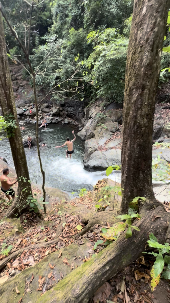 Taking the leap into a natural pool at Las Minas. Photo: Shawn Brooks Photography